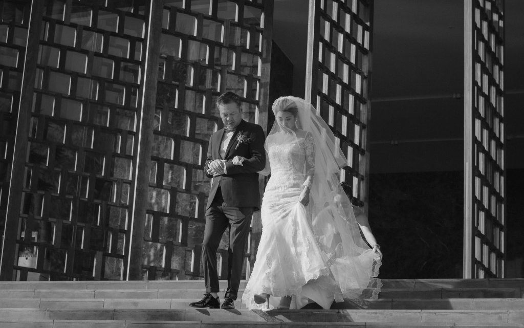 Award-winning Thailand wedding photographer captures HK bride walking down the aisle in Phuket