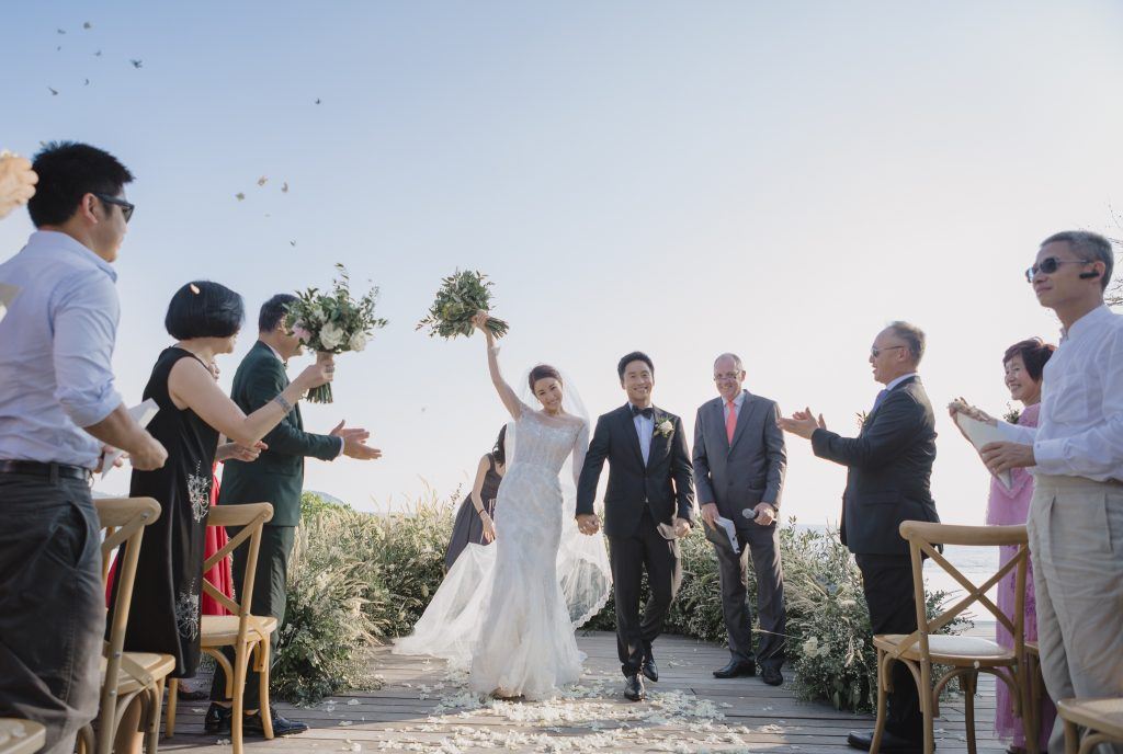 wedding photographer in Phuket, Thailand captures ceremony at The Naka Resort