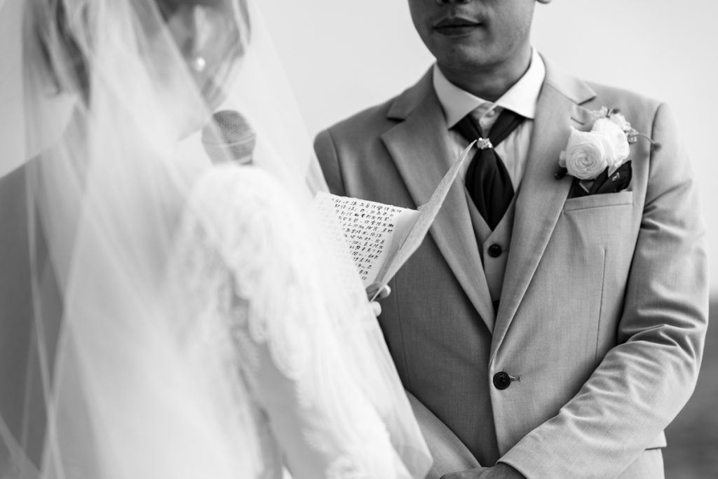 Wedding photographer in Koh Samui Photo of a Hong Kong Bride reading vows.