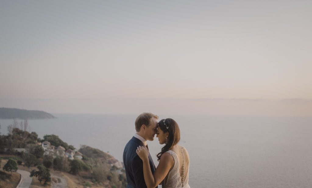 Sunset portrait of American couple at their destination wedding in Phuket. Thailand wedding photography by Daniel Baci