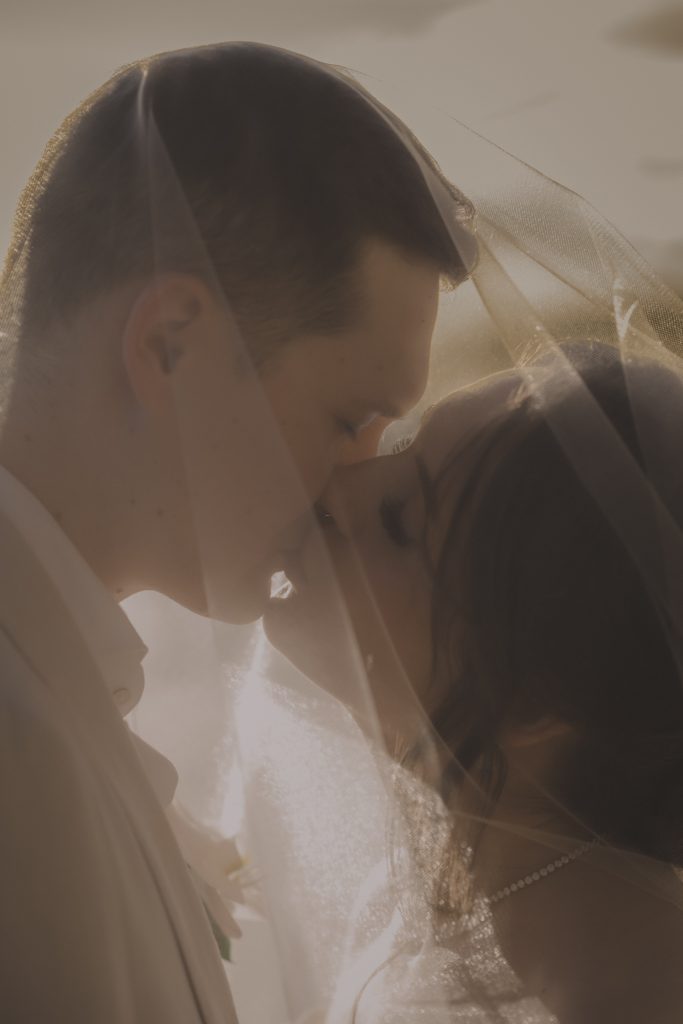 Krabi wedding photographer takes sunset portrait of Australian couple at Rayavadee Resort.