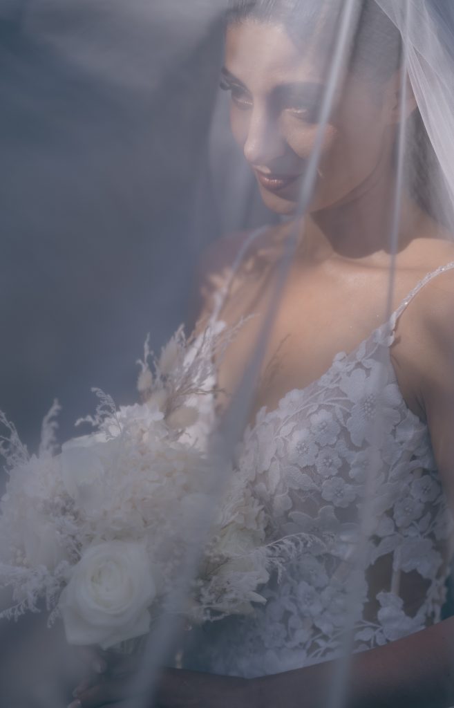 Bride under her veil at her destination wedding at Thavorn Beach Village. Photo by Phuket wedding photographer Daniel Baci
