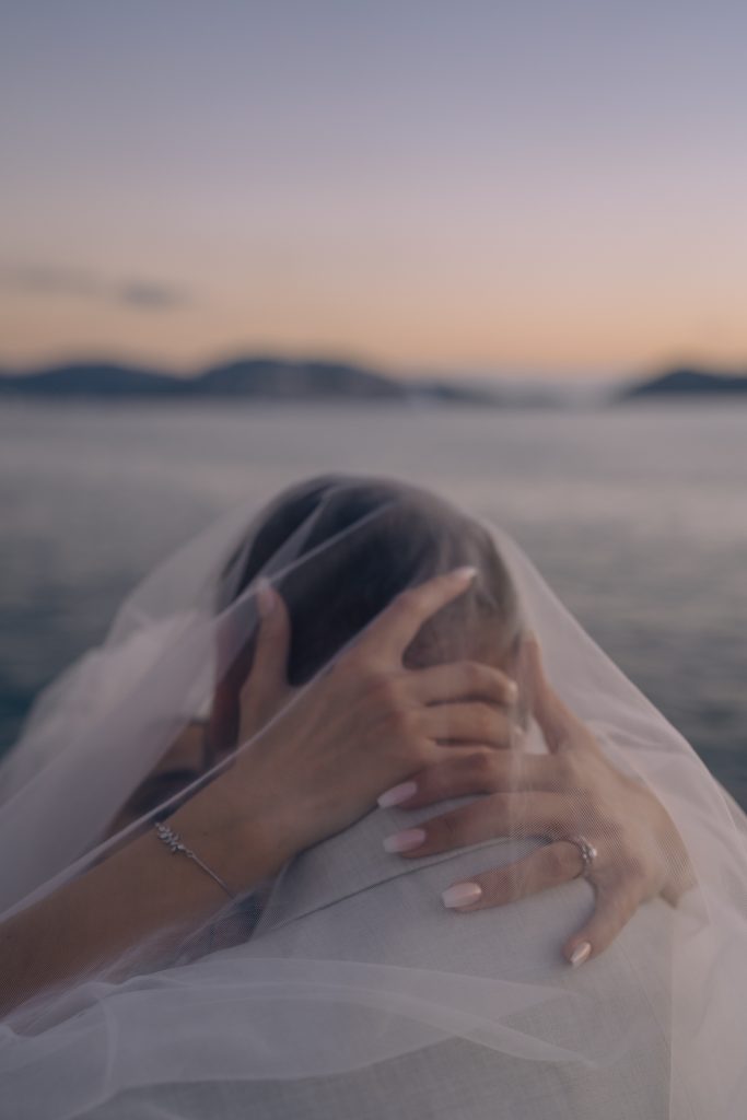 bride and groom's romantic sunset wedding portrait captured by Phuket wedding photographer Daniel Baci