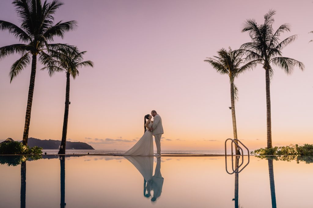 Sunset portrait of bride and groom at Phuket wedding Photographer