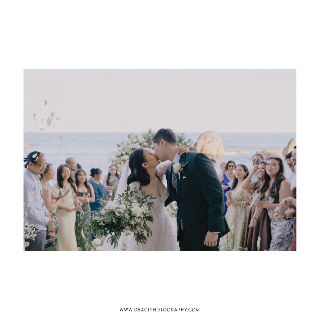 Bride and groom kiss at wedding ceremony at Silavadee Resort. Captured by Koh Samui wedding photographer Daniel Baci