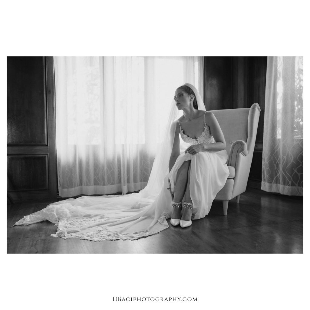 Bride putting on shoes at Phuket wedding in Thavorn beach village resort