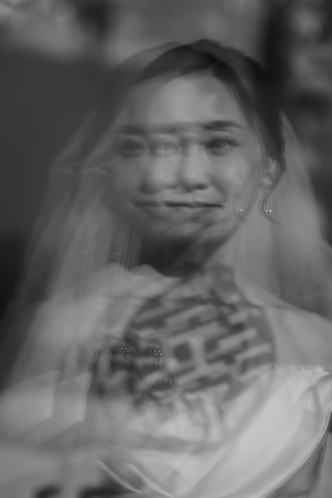 Creative black and white photo of Chinese bride at her destination wedding in Phuket.