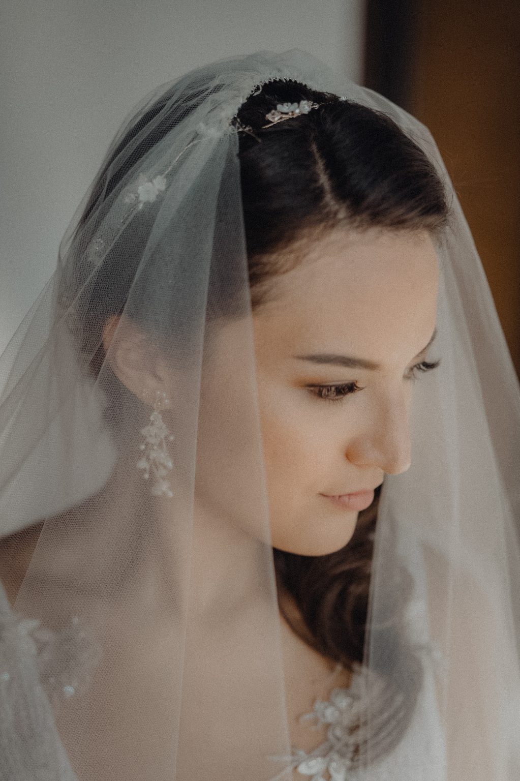 Bride wearing veil for portrait session with Thailand wedding photographer, Daniel Baci at the stunning luxury Villa in Phuket