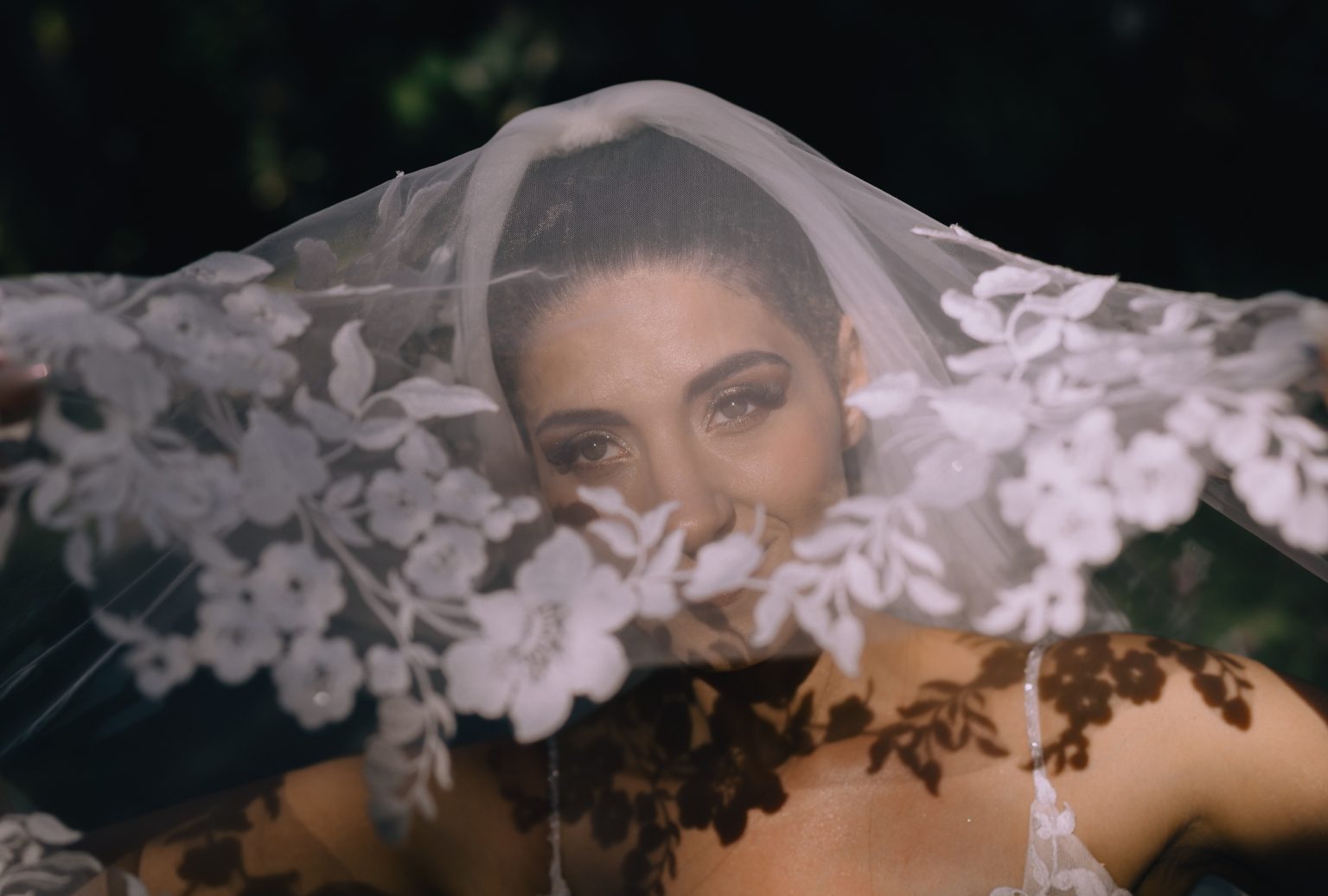 sunlight shines through brides veil at her destination wedding on Samui island