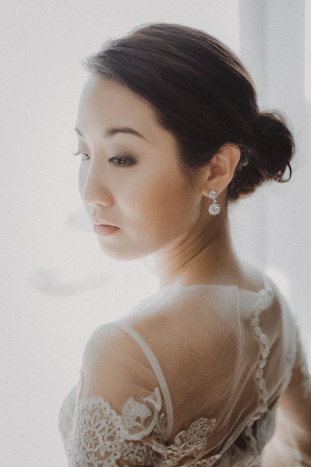Bride poses for wedding photography portrait in Thailand