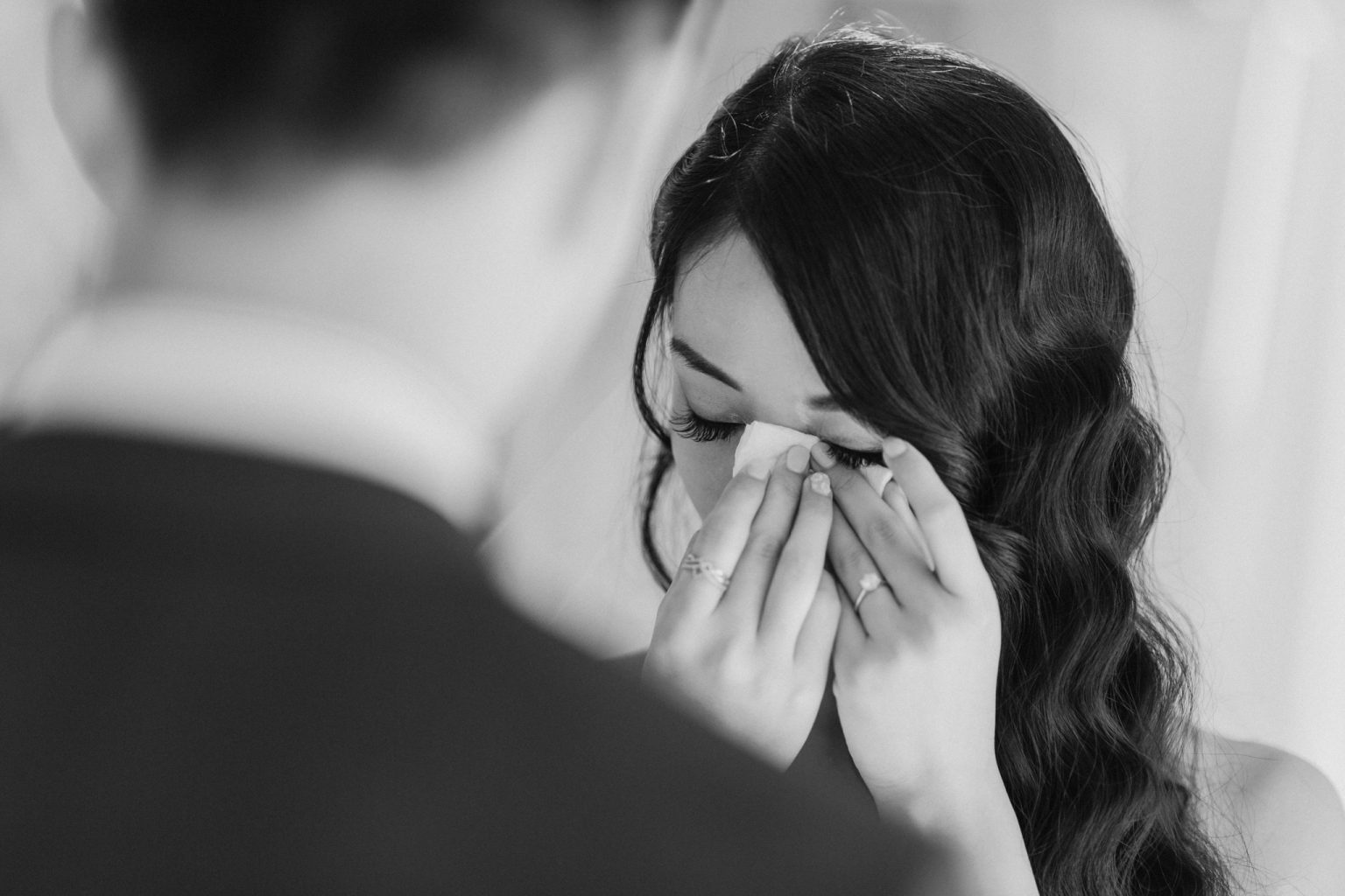 Black & white candid photo of bride crying during her Koh Samui wedding ceremony. Captured by Koh Samui wedding photographer, Daniel Baci.